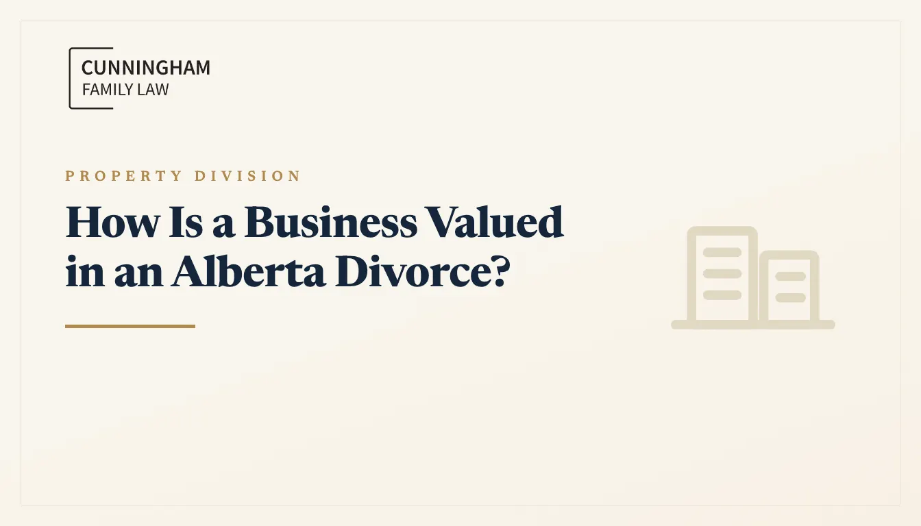Calgary business owner reviewing financial documents during divorce