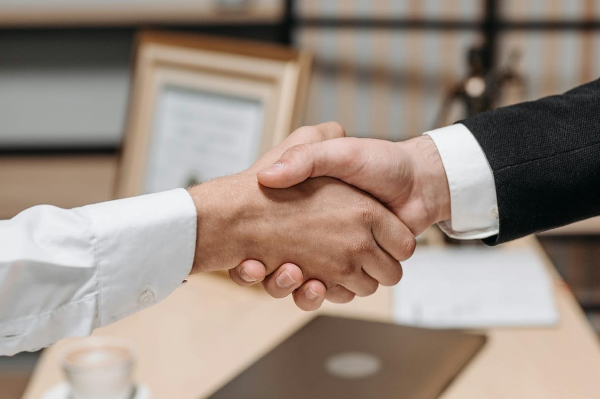 couple signing uncontested divorce documents