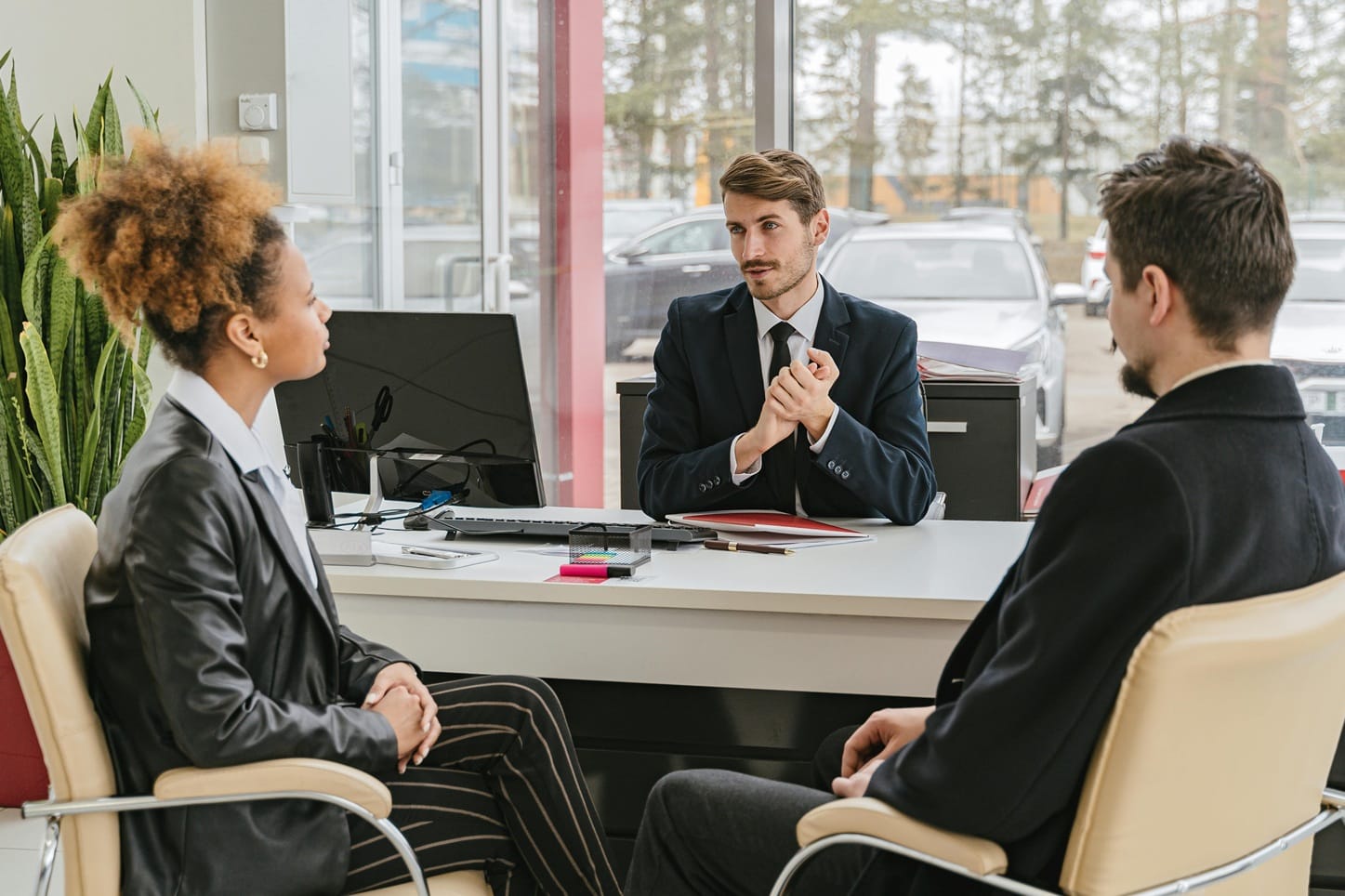 amicable divorce lawyer meeting with clients in calgary
